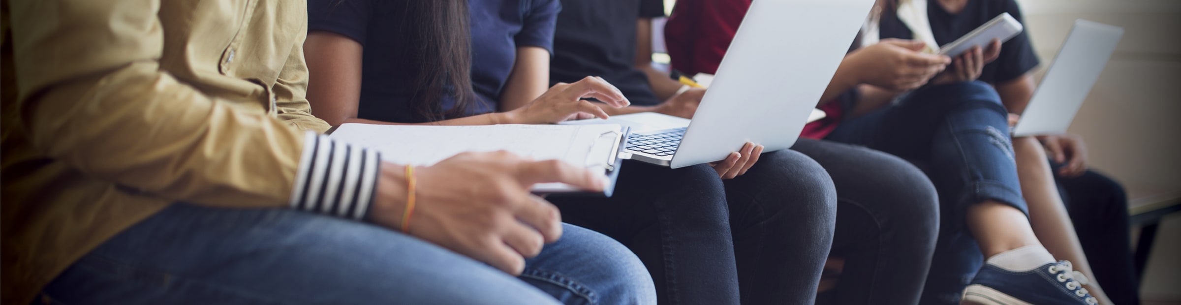 people looking at computer
