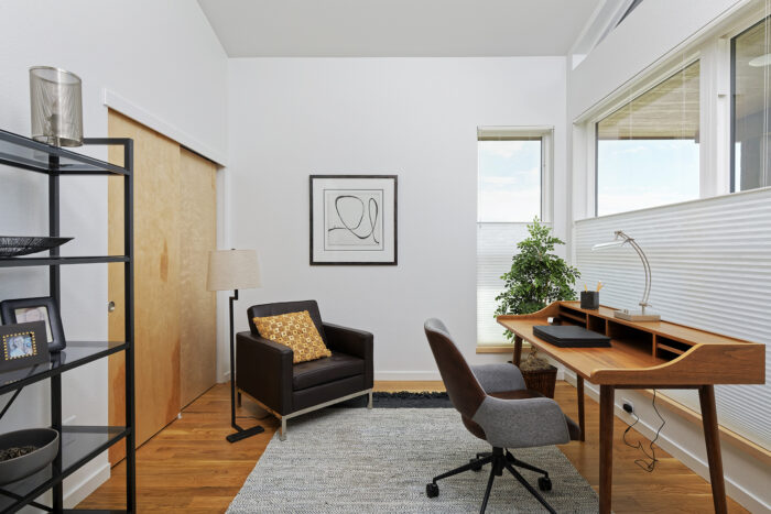 Home office with large windows